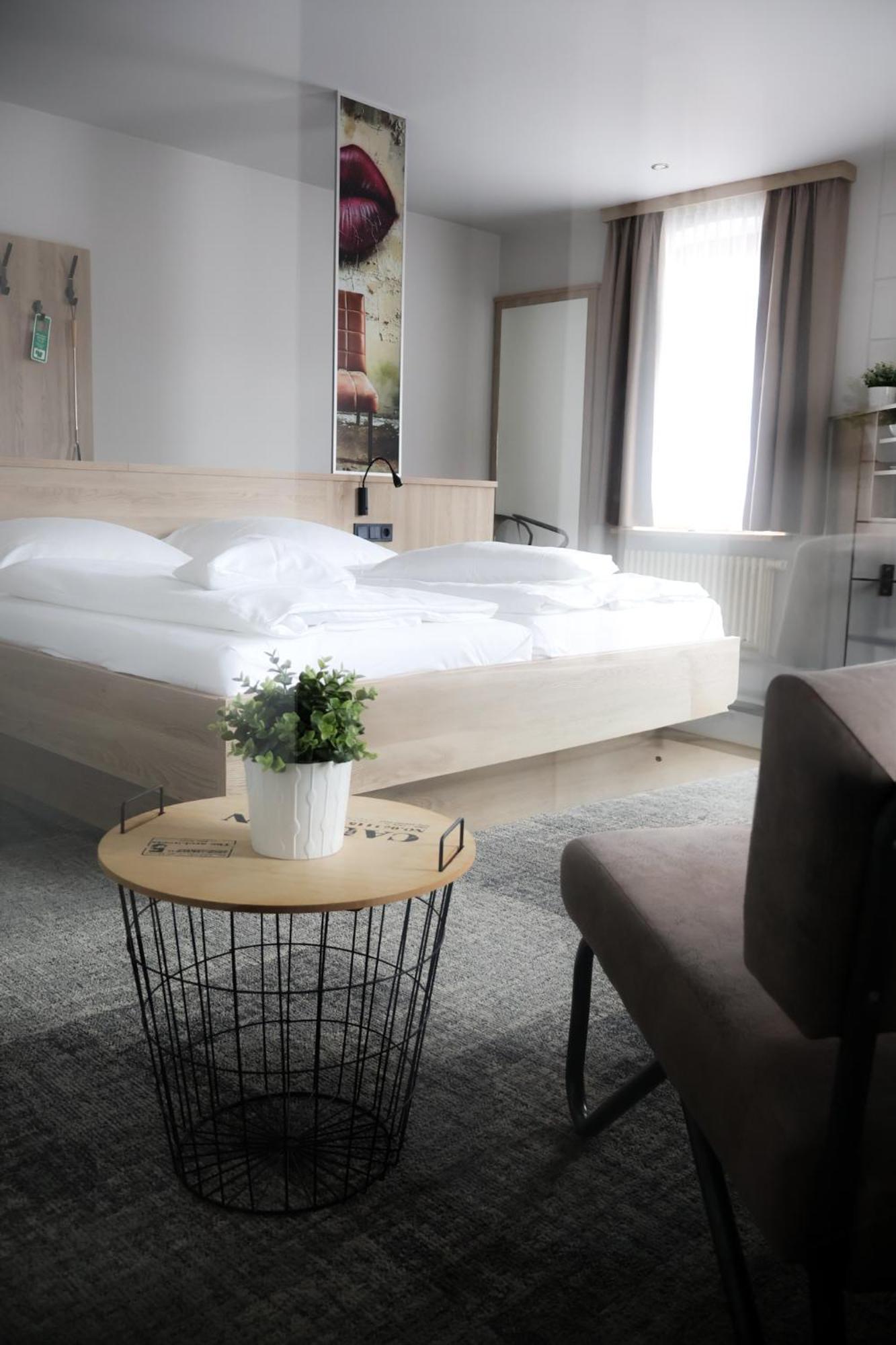 Alexxanders Hotel & Boardinghouse, Restaurant Кемниц Стая снимка
